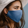 Image of woman wearing a blue mask